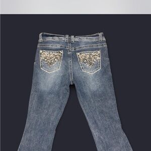 Stylish Blue Denim high waisted straight leg stretch denim jeans .
